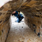 Kigbeare Kiln Project - Brigitte working on the damper